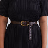 Cream co-ord set with pleated trousers, angled view